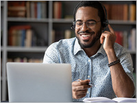 Smiling,African,American,Man,In,Glasses,And,Headset,Watch,Webinar
